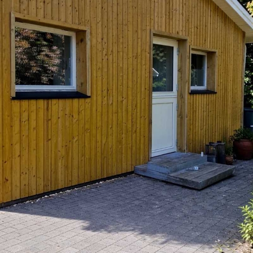 Montering af Træ beklædning på facade på sommerhus i 4500 Nykøbing sjælland