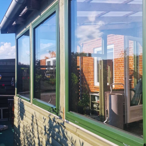 Energioptimering med nye 2-lagsglas vinduer i udestue i 4200 Slagelse