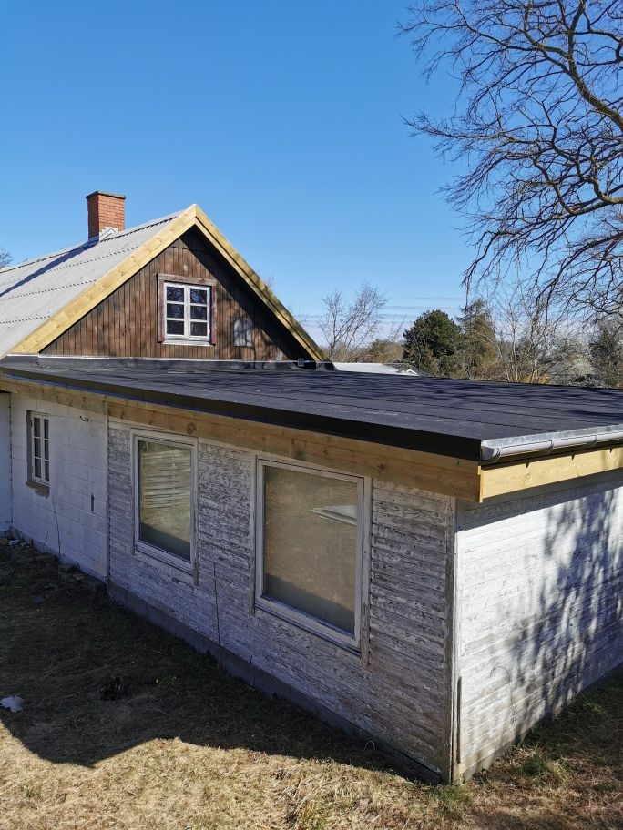 Udskiftning af tagpap tag samt nye tagrender i 4593 Eskebjerg ( Kaldred ) 